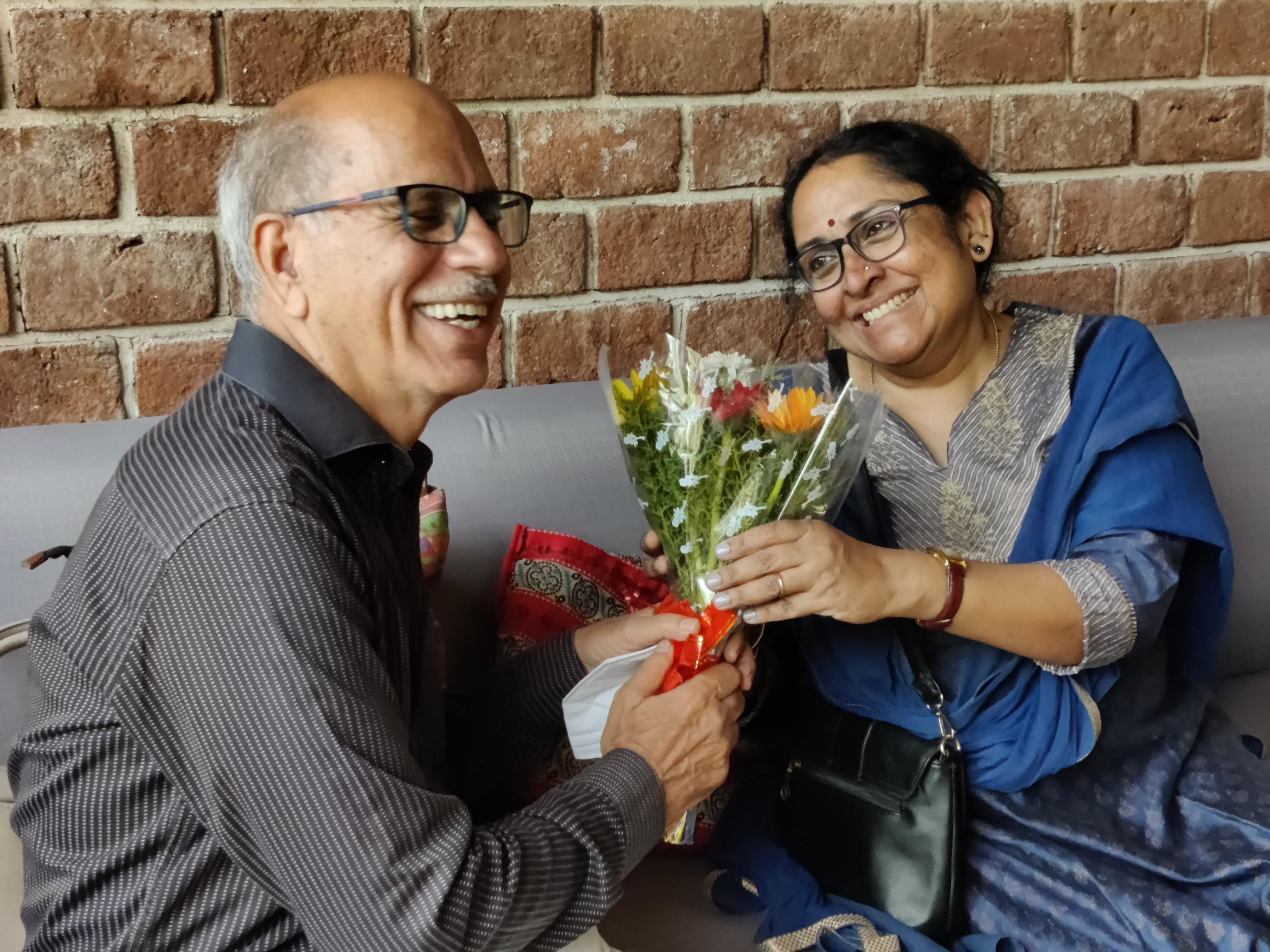 Man giving Bouquet to the woman